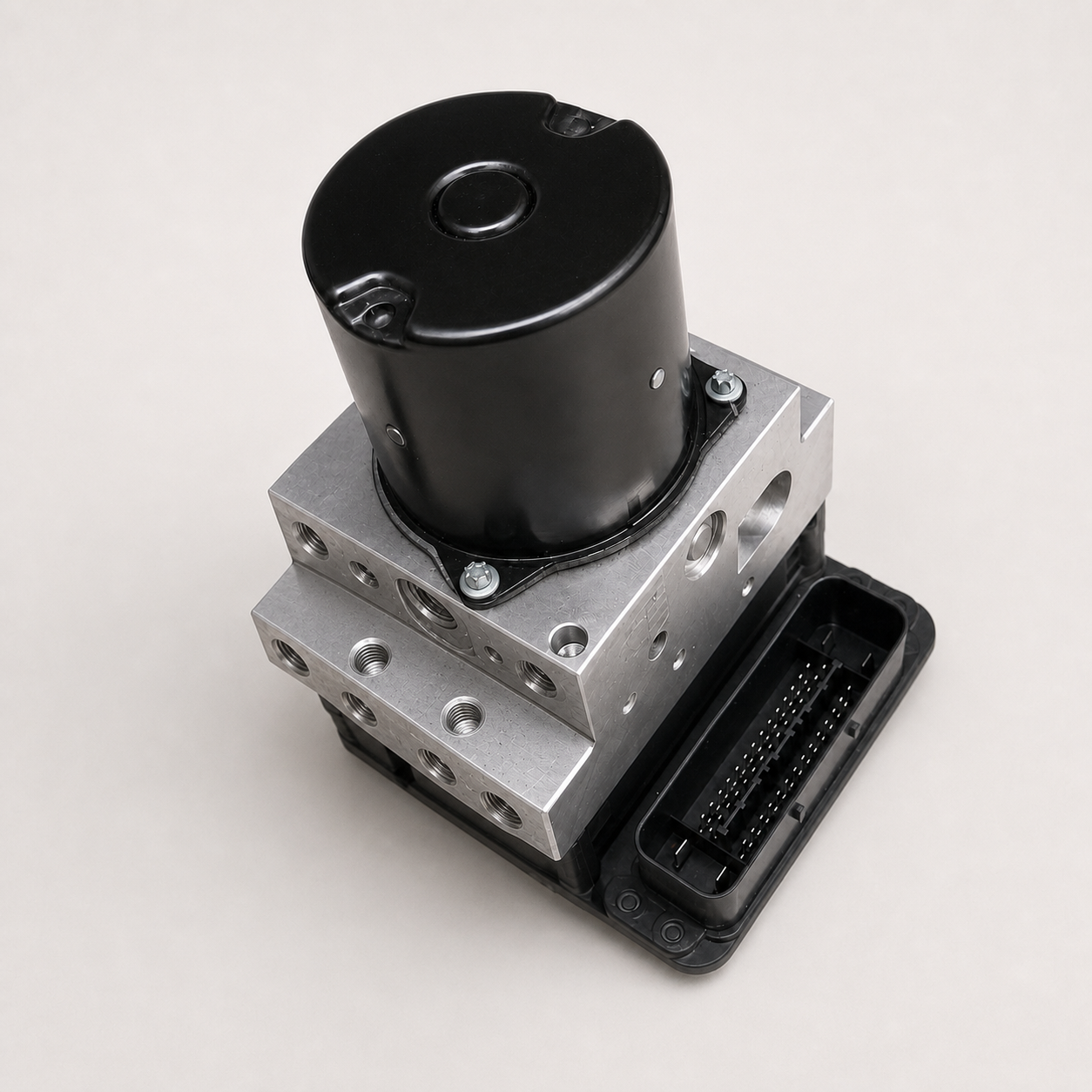 BMW E60 DSC8 ABS hydraulic control unit with exposed brake-line ports for remote 8HP programming
